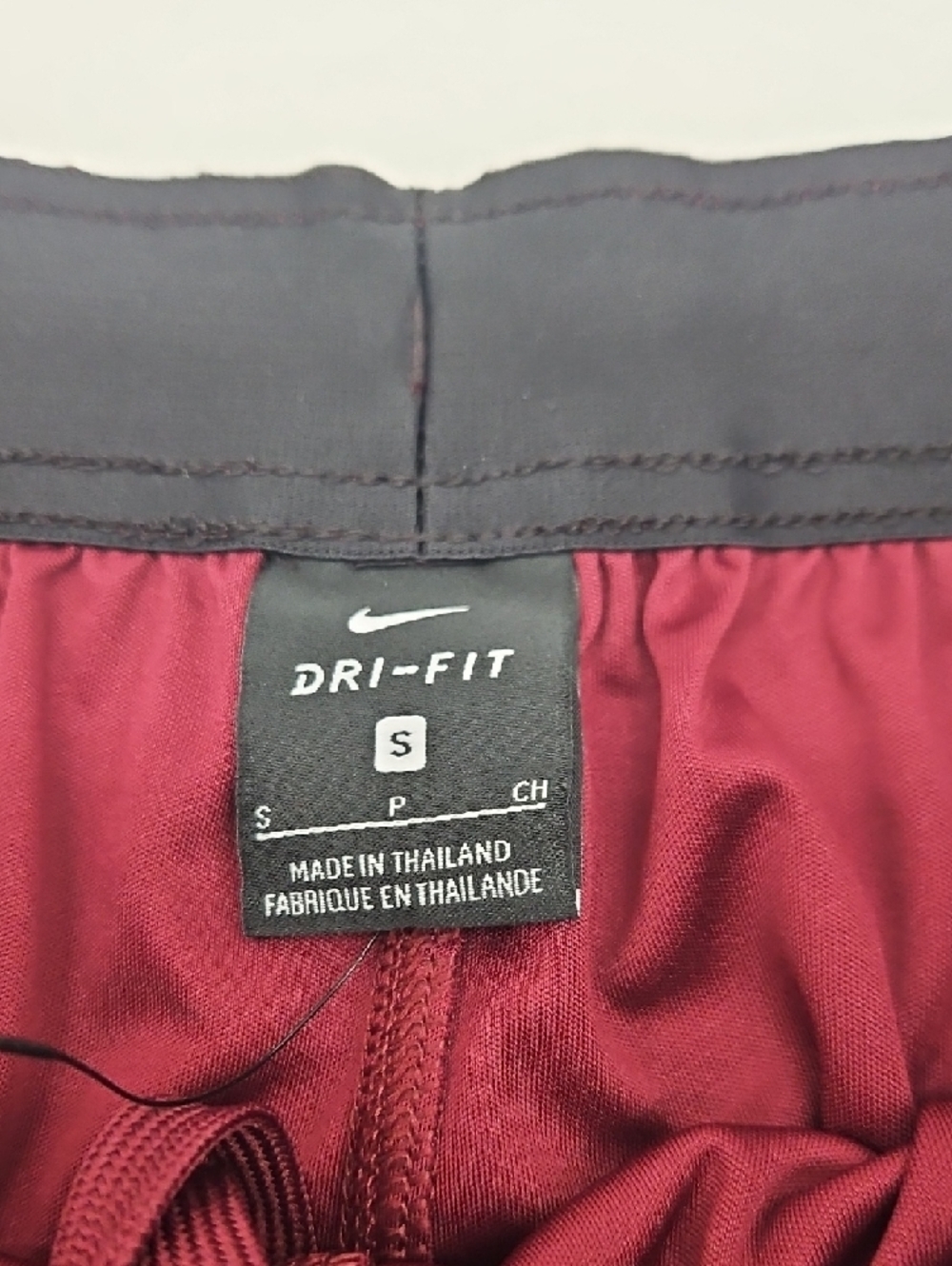 Nike Maroon Athletic Shorts with White Swoosh - Picture 2 of 8